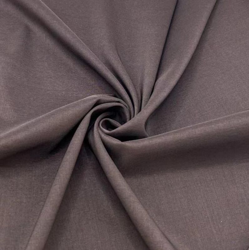 Recycled warp gebreide polyesterstof elastane plain weefsel 170D*170D+40D Voor kleding