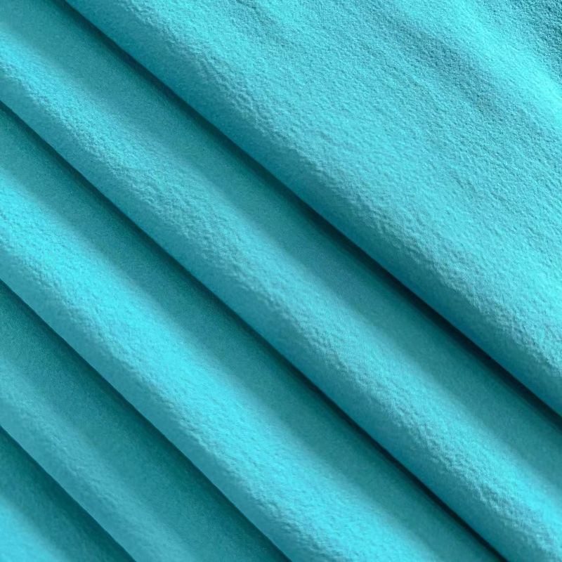 Lichtelijk gerimpelde nylon spandexstof gerecycled 4 way stretch 40D+20D*40D+20D 90GSM