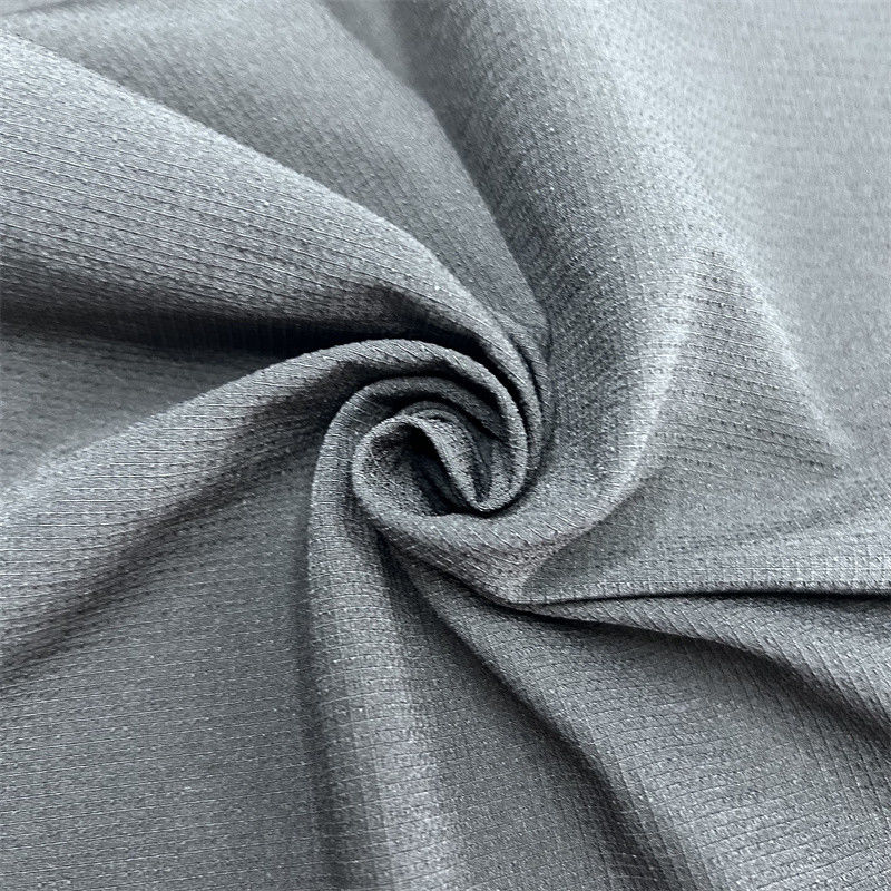 Semi-glansend nylon geblokkeerd bergklimstof Dikke elastische textuur Voor buitenkleding