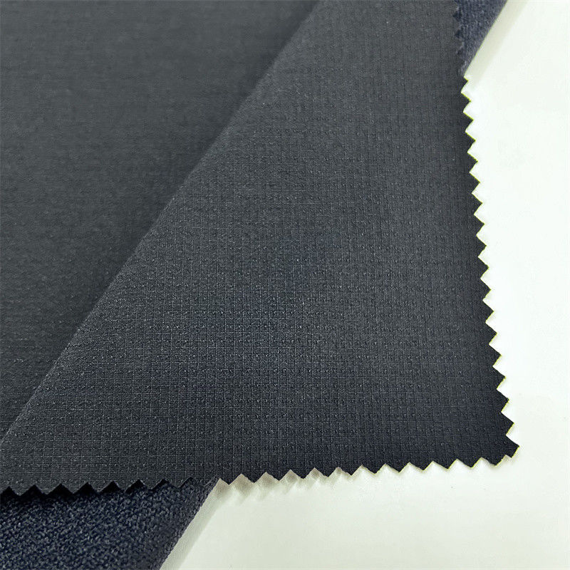Semi-glansend nylon geblokkeerd bergklimstof Dikke elastische textuur Voor buitenkleding