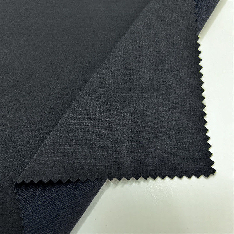 Semi-glansend nylon geblokkeerd bergklimstof Dikke elastische textuur Voor buitenkleding