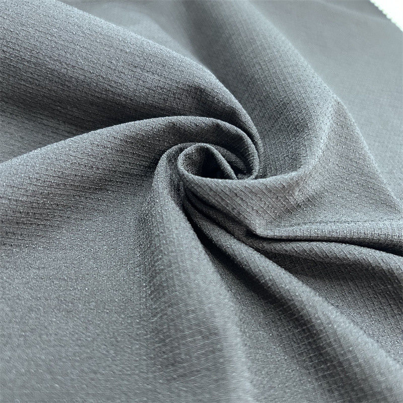 Semi-glansend nylon geblokkeerd bergklimstof Dikke elastische textuur Voor buitenkleding